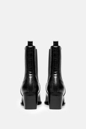 Teura – black boots | TWENTYFOURHAITCH – back view